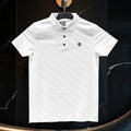 White polo shirt with a brand logo on a dark marble background